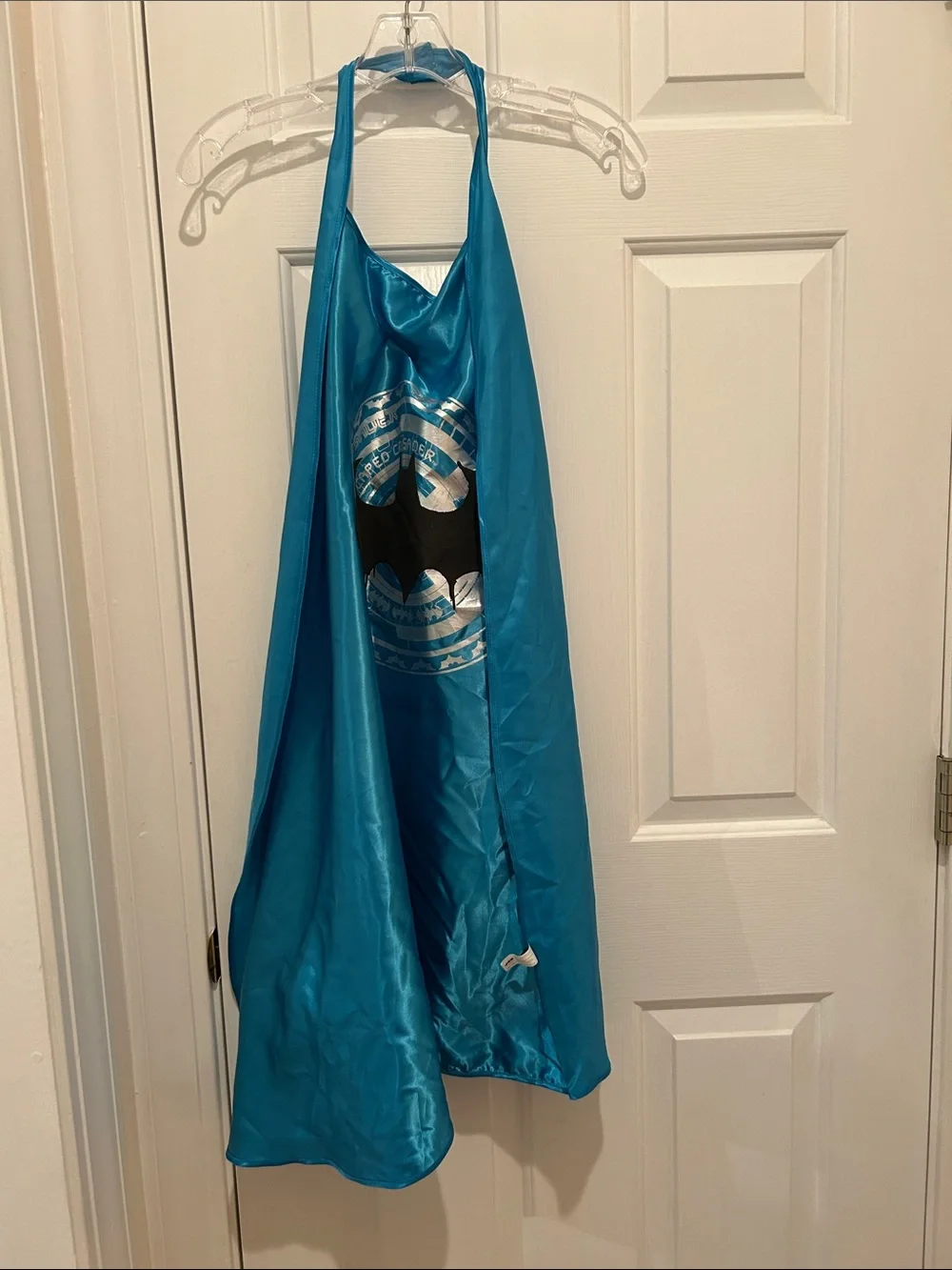 Bright blue Batman cape